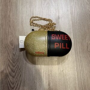 Gold and Black Capsule Clutch Bag